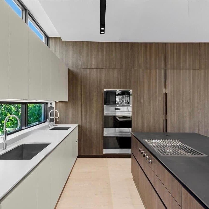 Frameless melamine kitchen with integrated appliances
