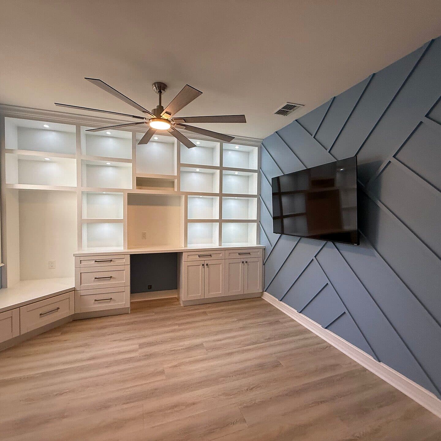 Custom office built-ins with accent wall