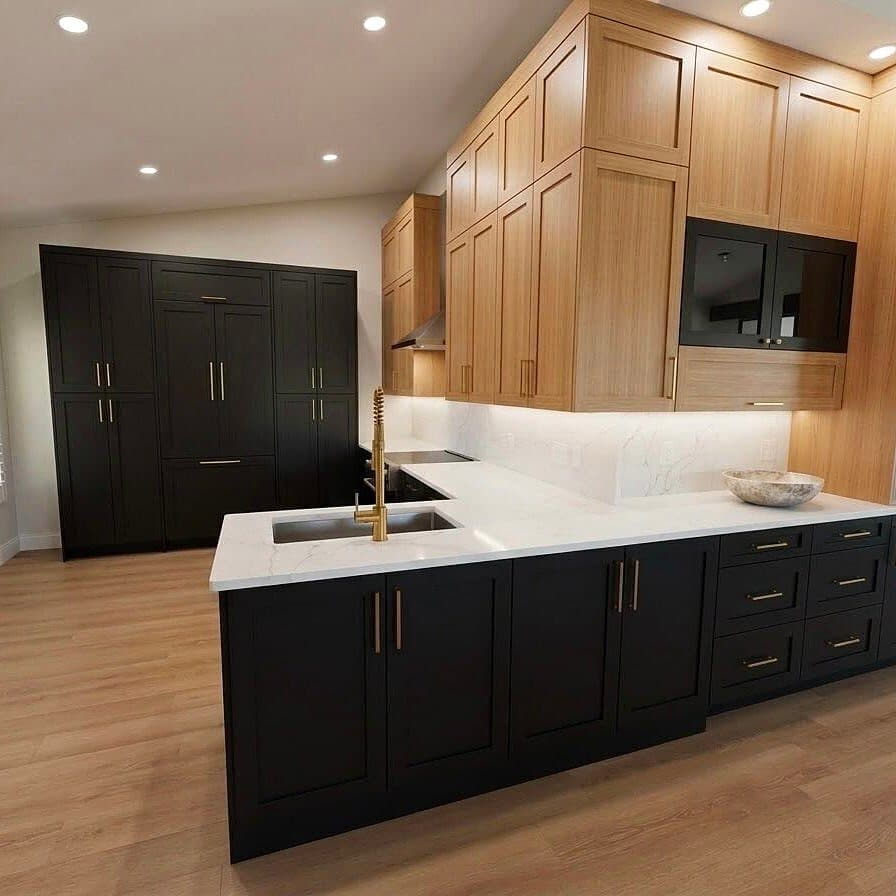 Two-tone Shaker kitchen — black and white oak with brass hardware